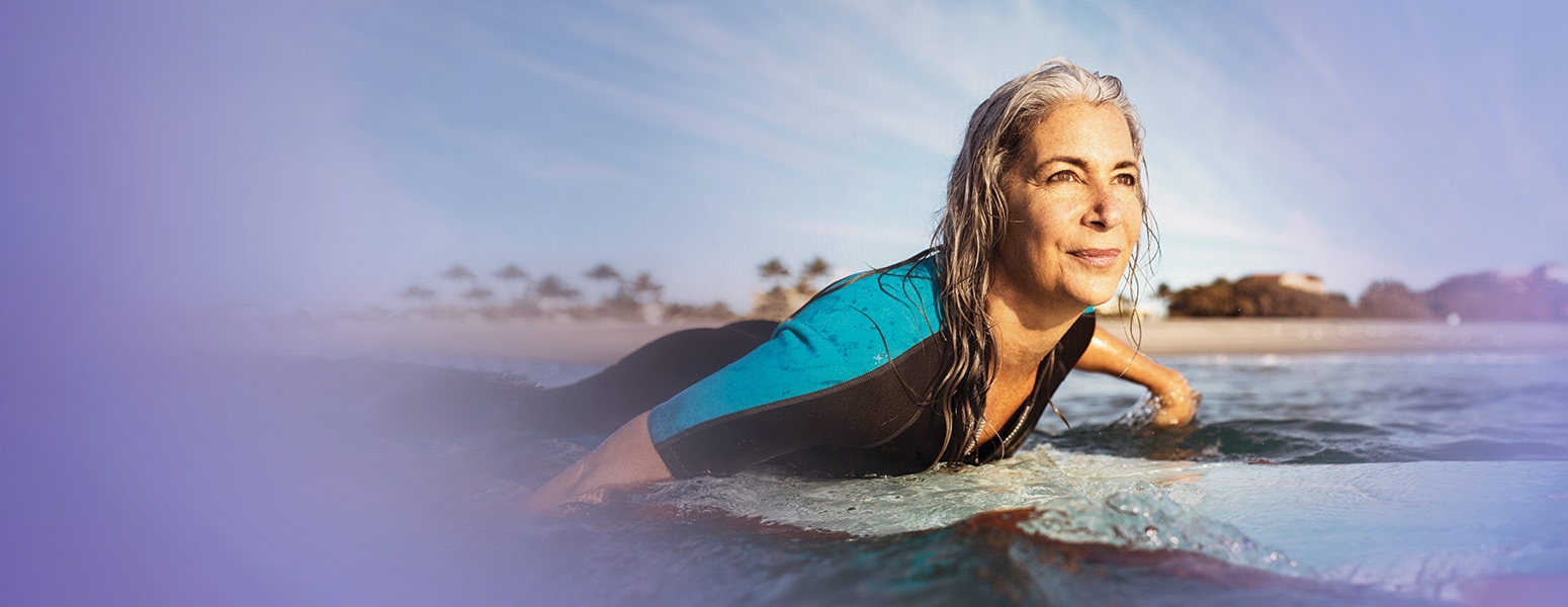 Mature woman surfing